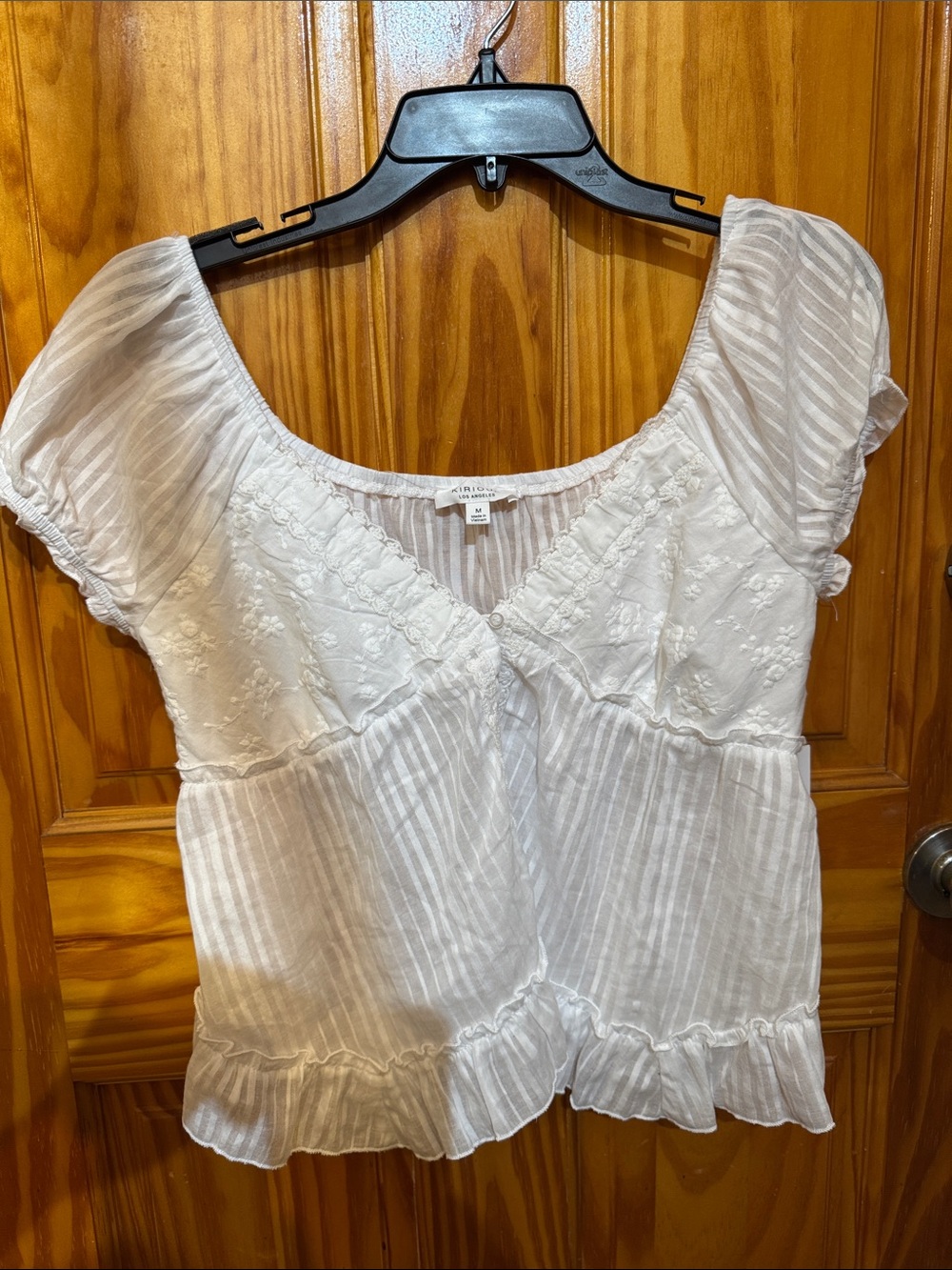 White Embroidered Peasant Blouse with Ruffle Hem